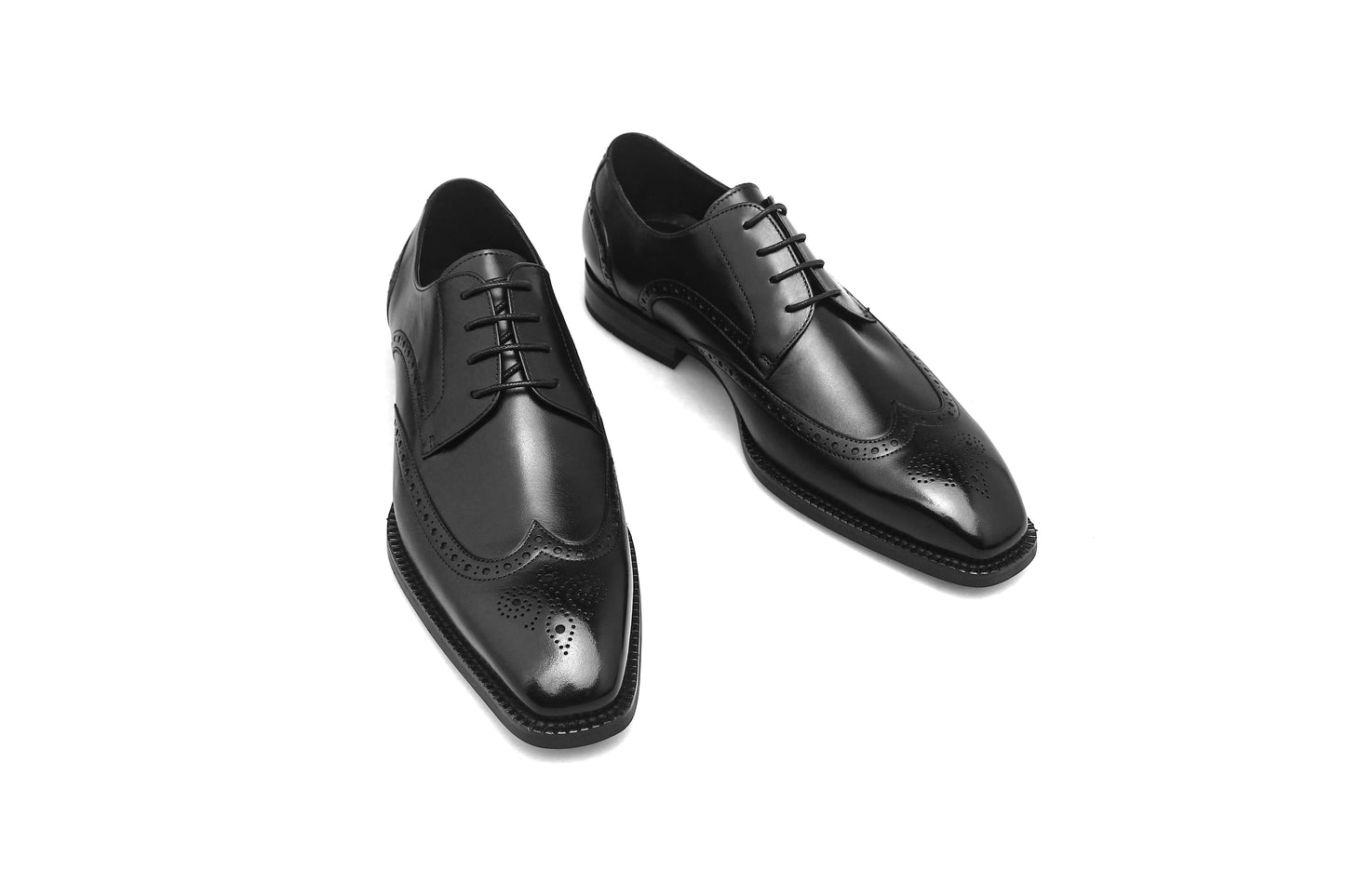 Black Elegance Brogue Derby with premium leather finish and intricate brogue detailing, tailored for the modern gentleman.