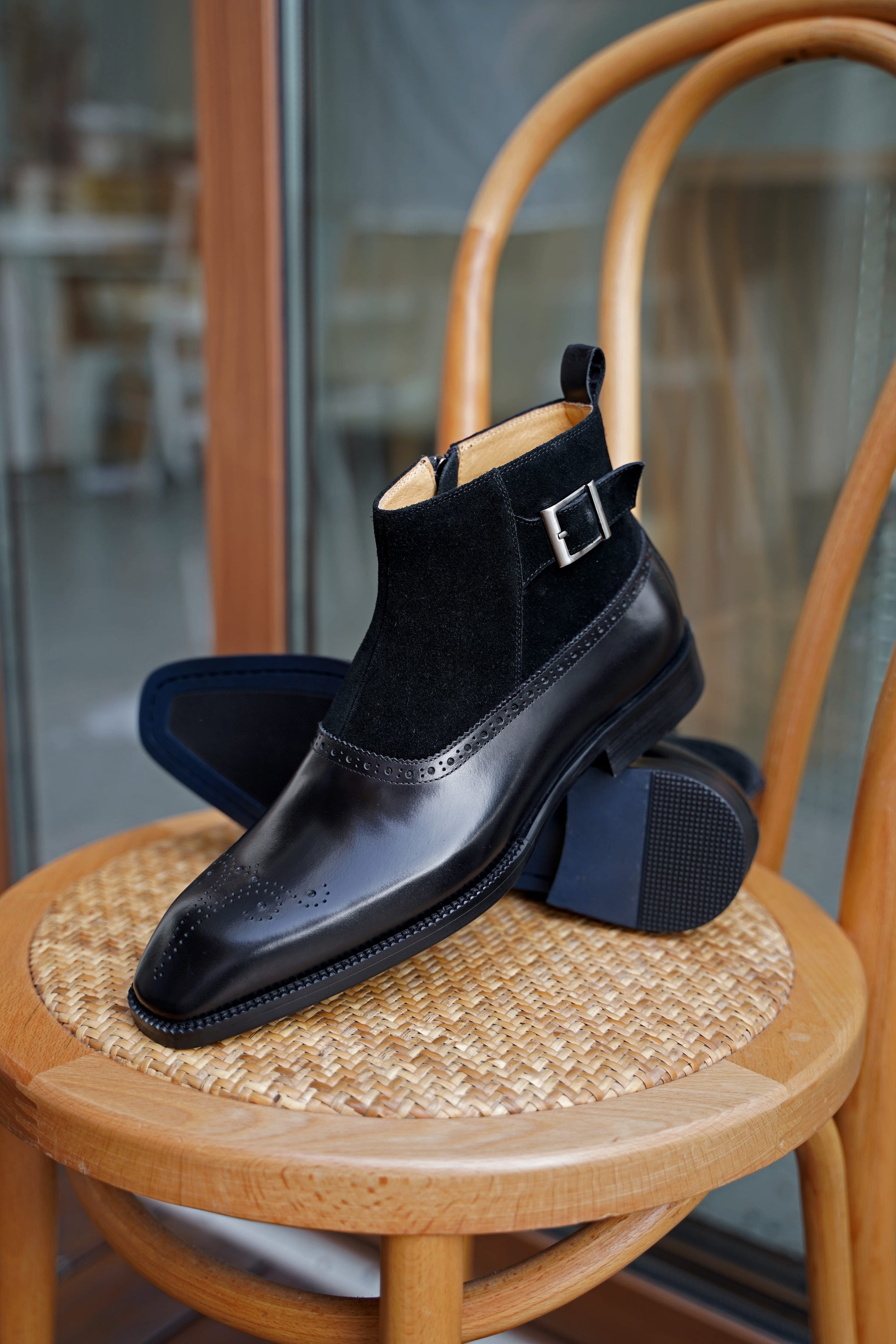 Onyx Shadow Brogue Chelsea Boots featuring black leather toe and shadow black suede upper with brogue detailing and buckle.