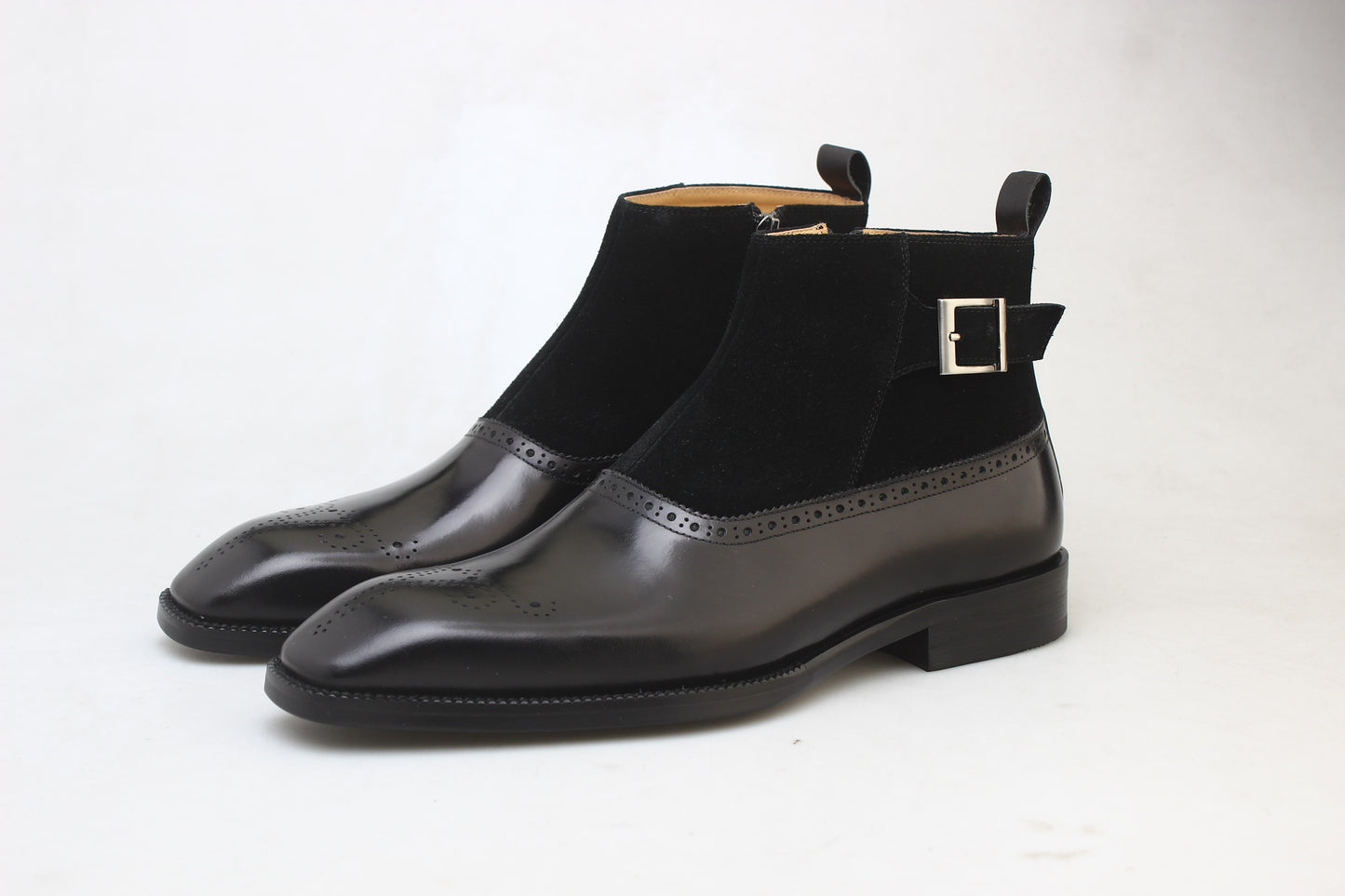 Onyx Shadow Brogue Chelsea Boots featuring black leather toe and shadow black suede upper with brogue detailing and buckle.