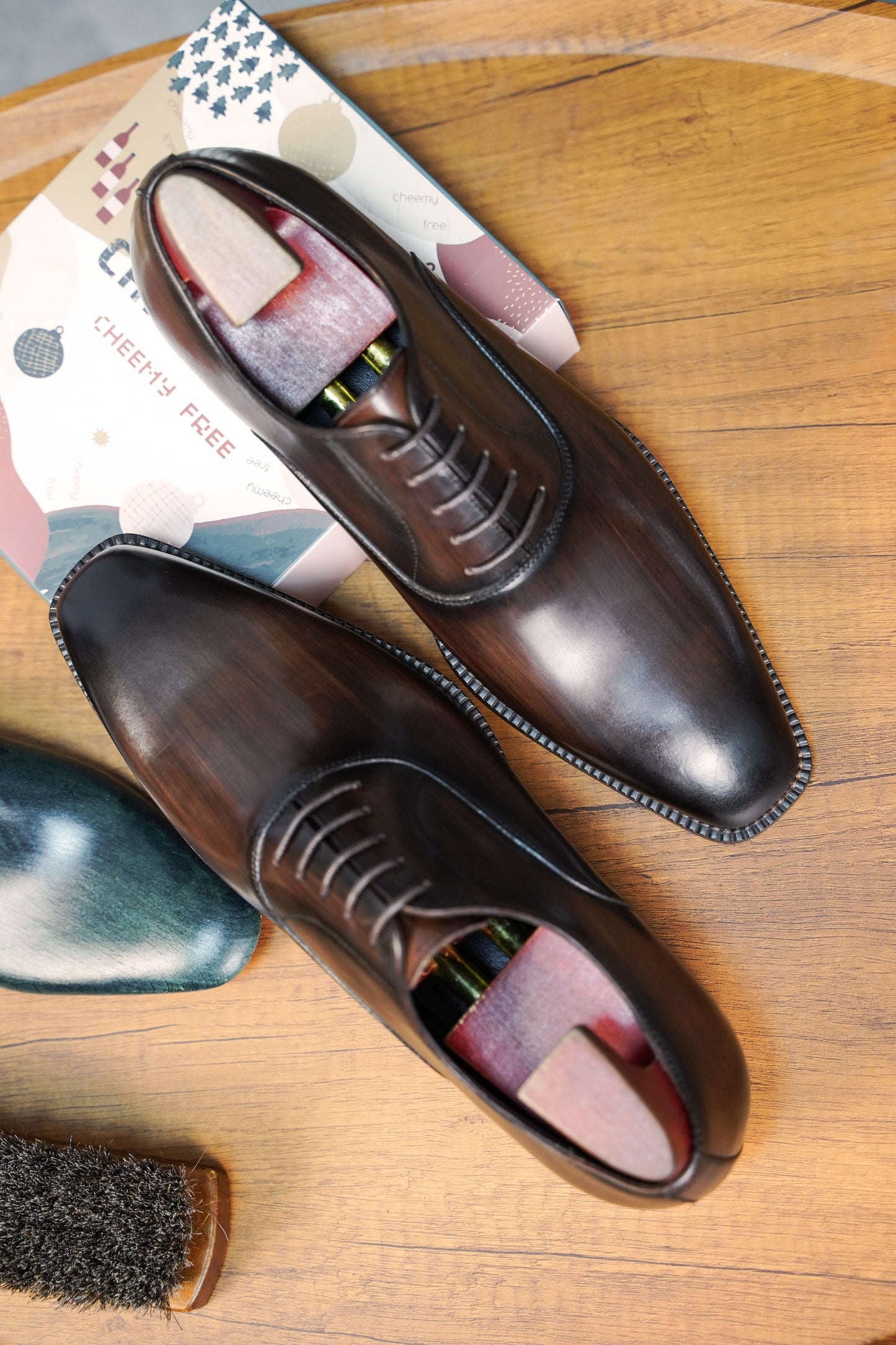 Espresso Elegance Oxford with sleek closed lacing, crafted from premium brown leather for formal events.