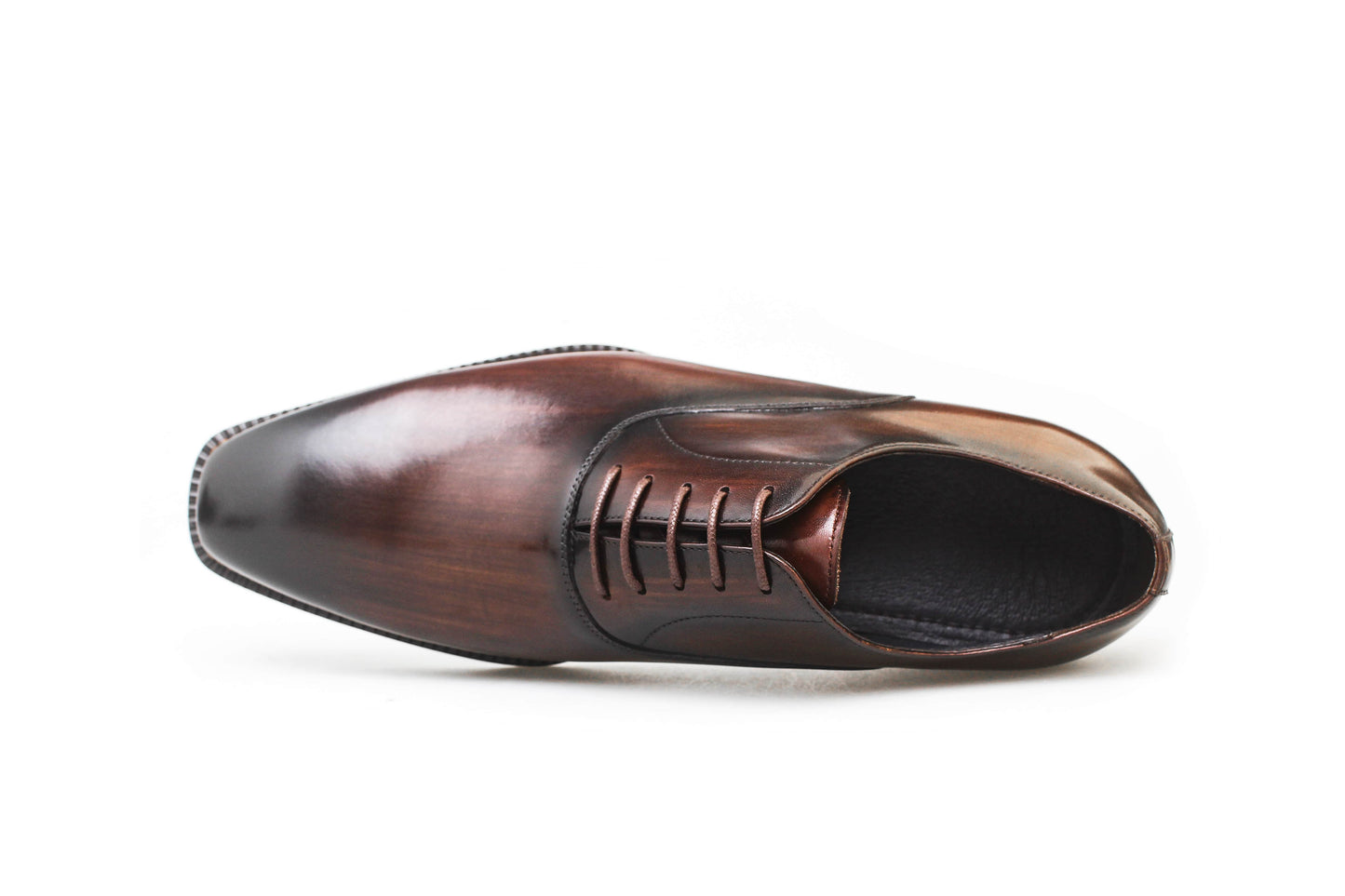 Espresso Elegance Oxford with sleek closed lacing, crafted from premium brown leather for formal events.