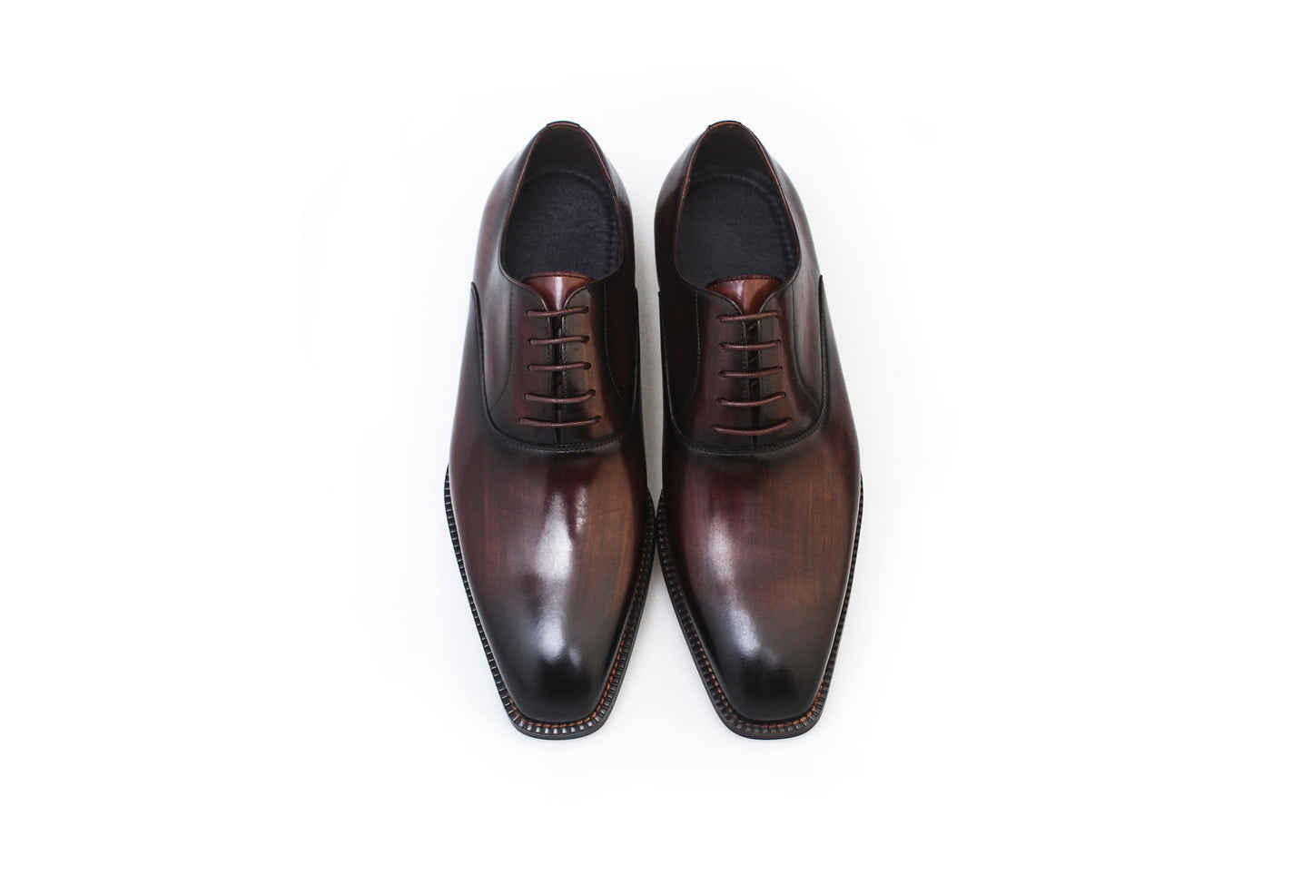 Espresso Elegance Oxford with sleek closed lacing, crafted from premium brown leather for formal events.