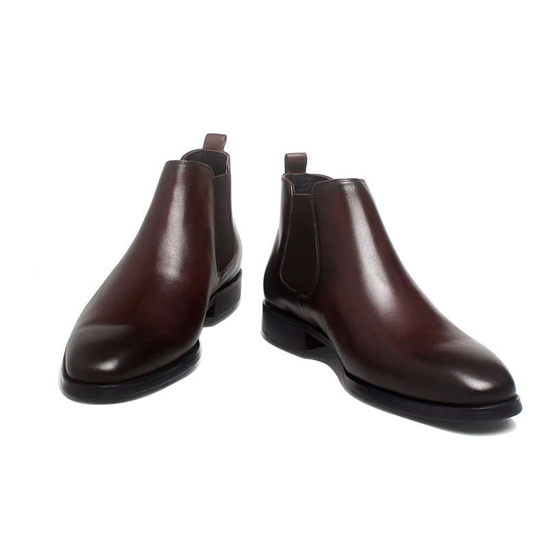 Espresso Majesty Chelsea Boots in polished espresso brown leather, featuring elastic side panels for a refined and comfortable fit.