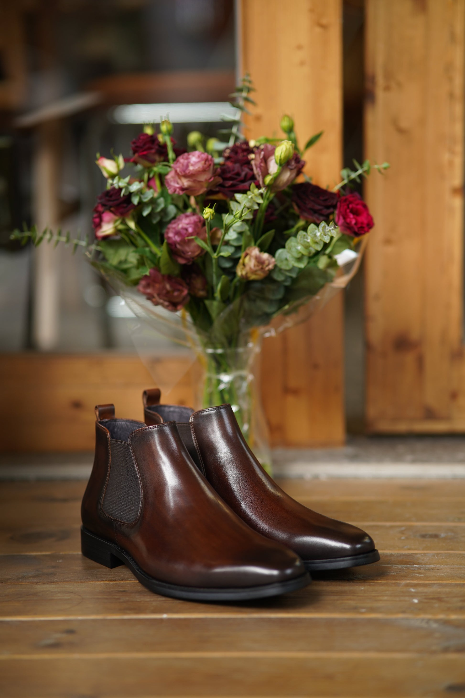 Espresso Majesty Chelsea Boots in polished espresso brown leather, featuring elastic side panels for a refined and comfortable fit.