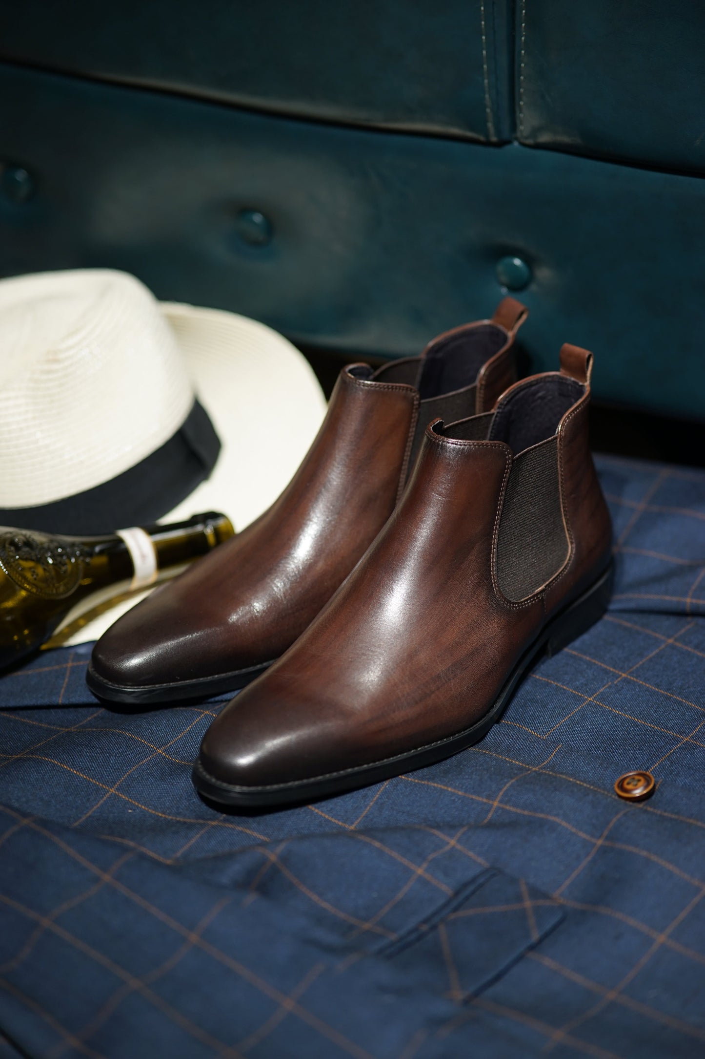 Espresso Majesty Chelsea Boots in polished espresso brown leather, featuring elastic side panels for a refined and comfortable fit.