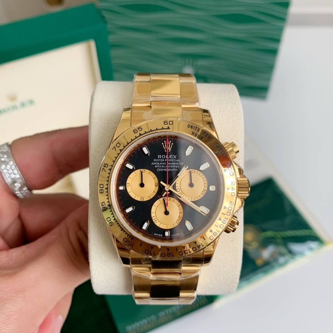 Rolex Cosmograph Daytona 18kt Oro Giallo Champagne Nero