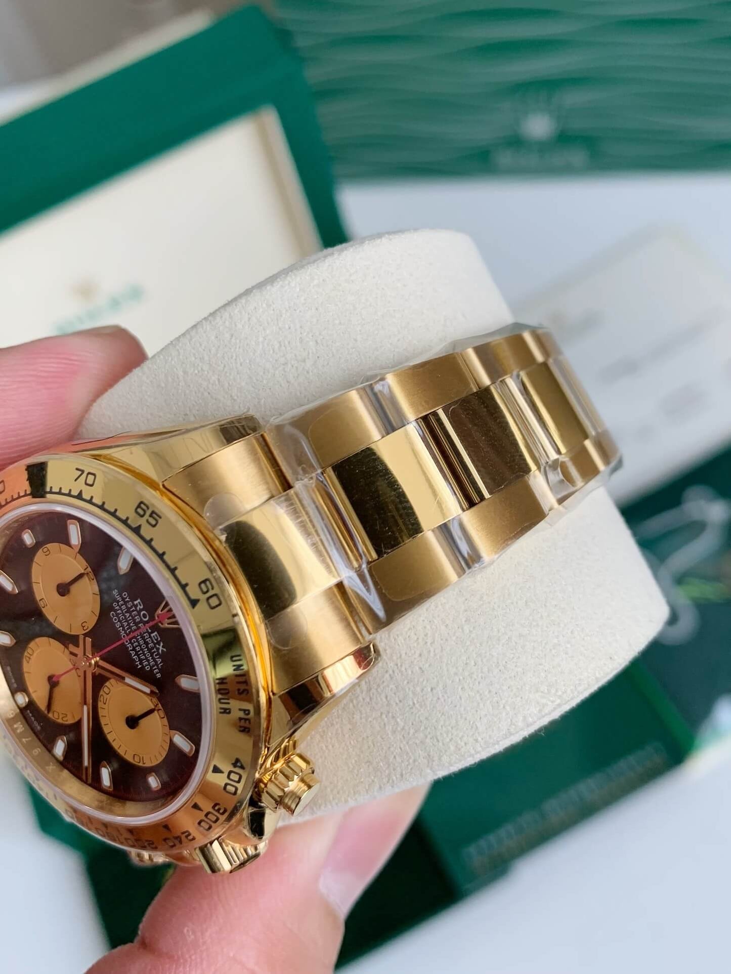 Rolex Cosmograph Daytona 18kt Yellow Gold Black Champagne