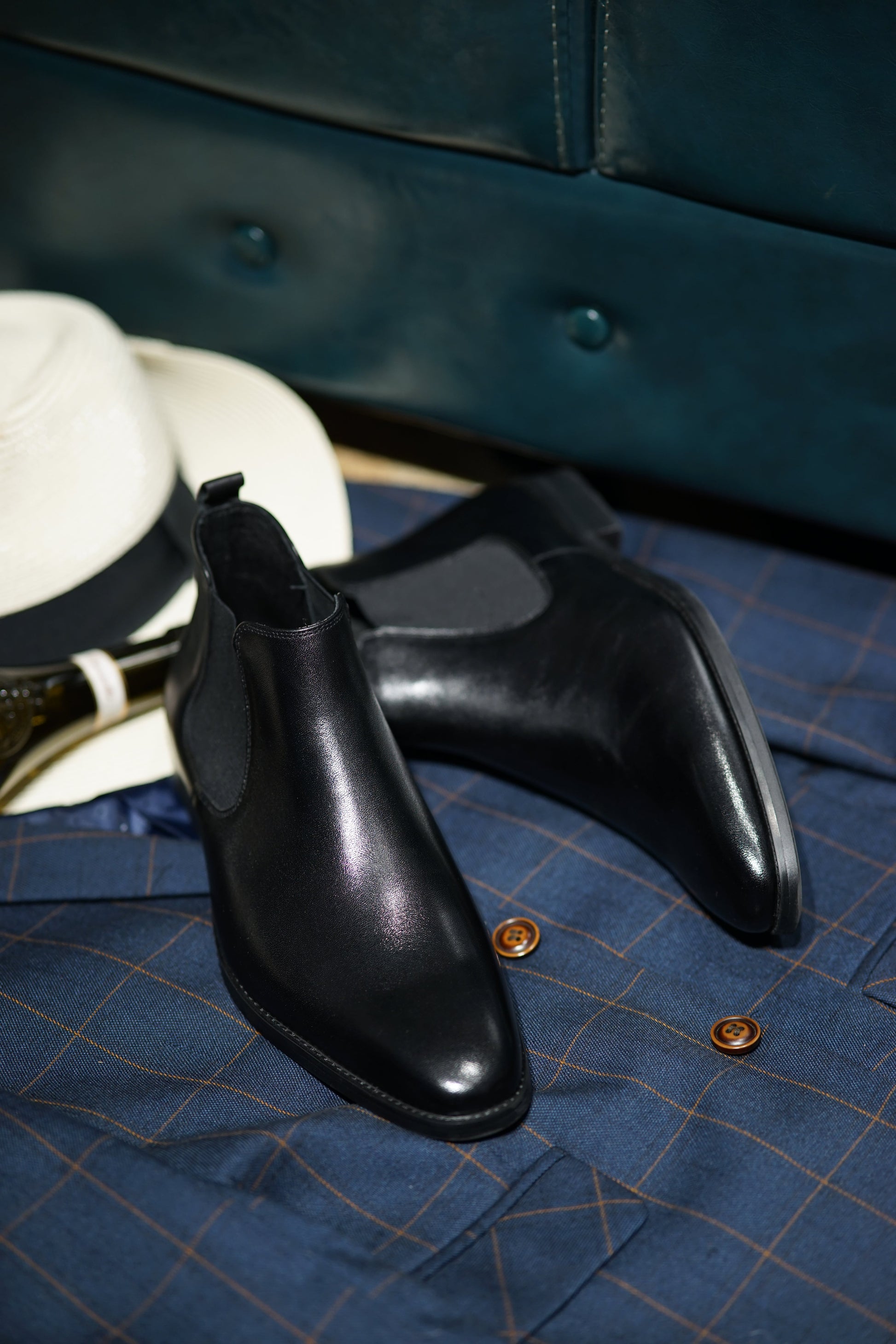 Jet Black Classic Chelsea Boots with high-gloss leather finish and elastic side panels for a sleek, polished look.