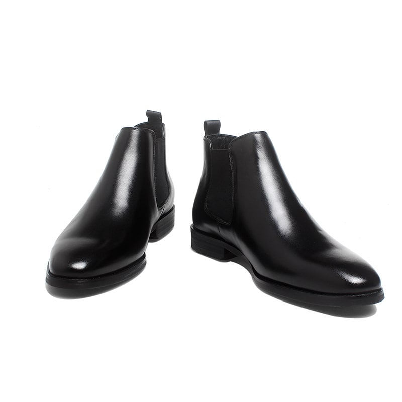 Jet Black Classic Chelsea Boots with high-gloss leather finish and elastic side panels for a sleek, polished look.