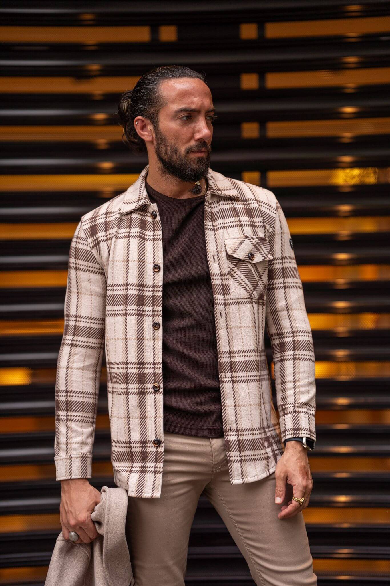 A Beıge-Brown Lumberjack Shirt on display.