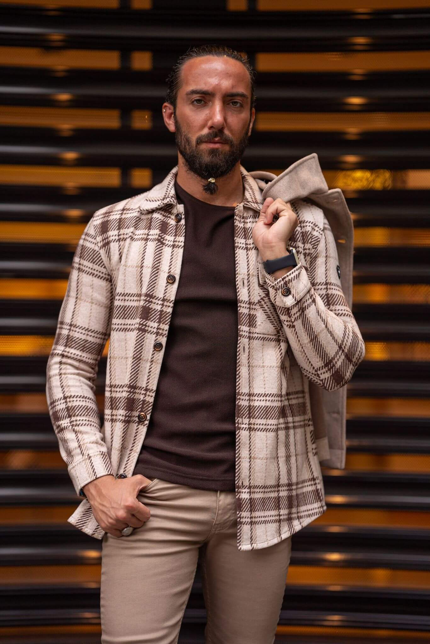 A Beıge-Brown Lumberjack Shirt on display.