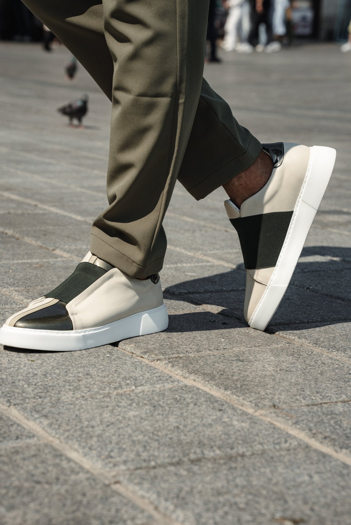 A Beige & Khaki Sneakers on Display. 