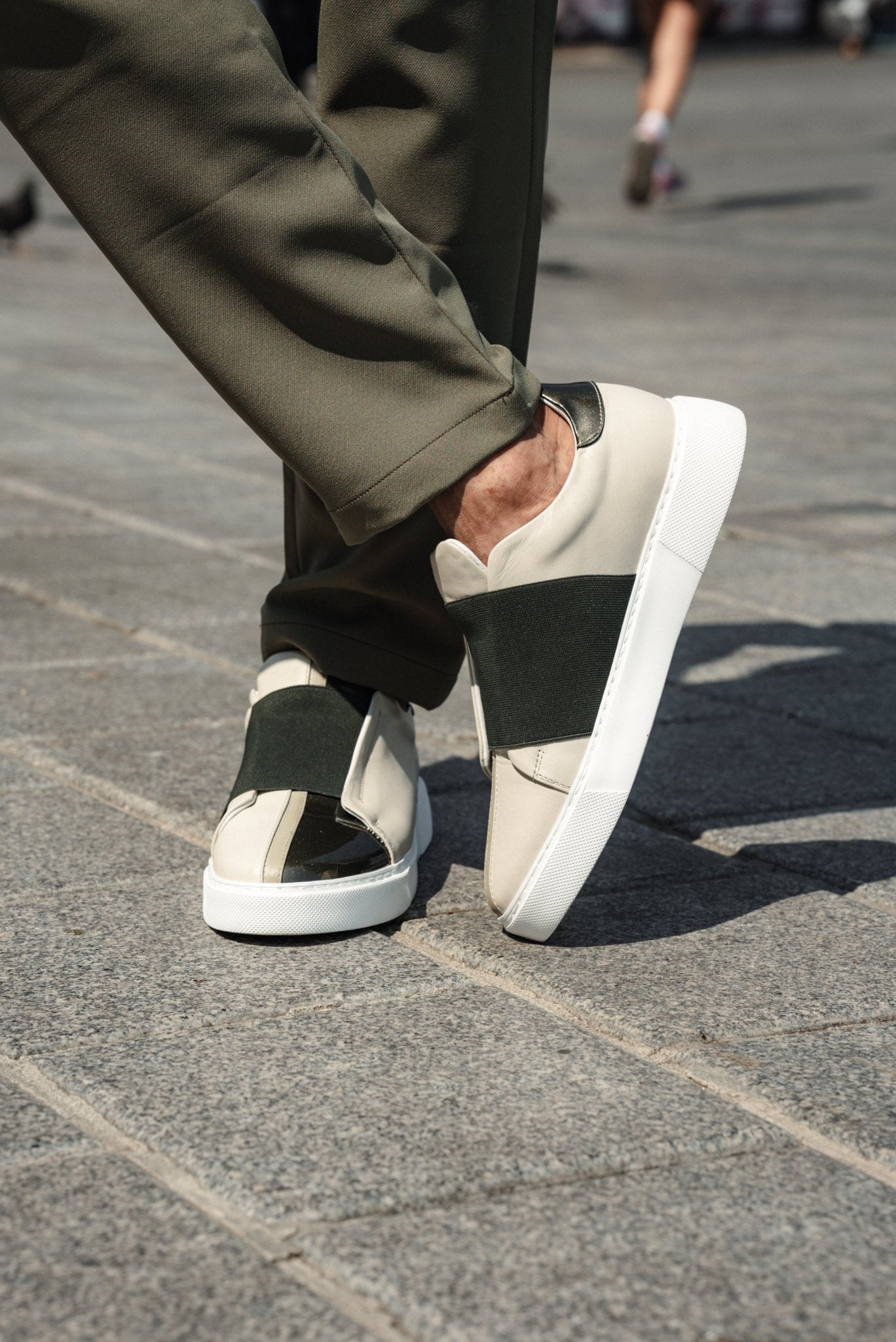 A Beige & Khaki Sneakers on Display. 