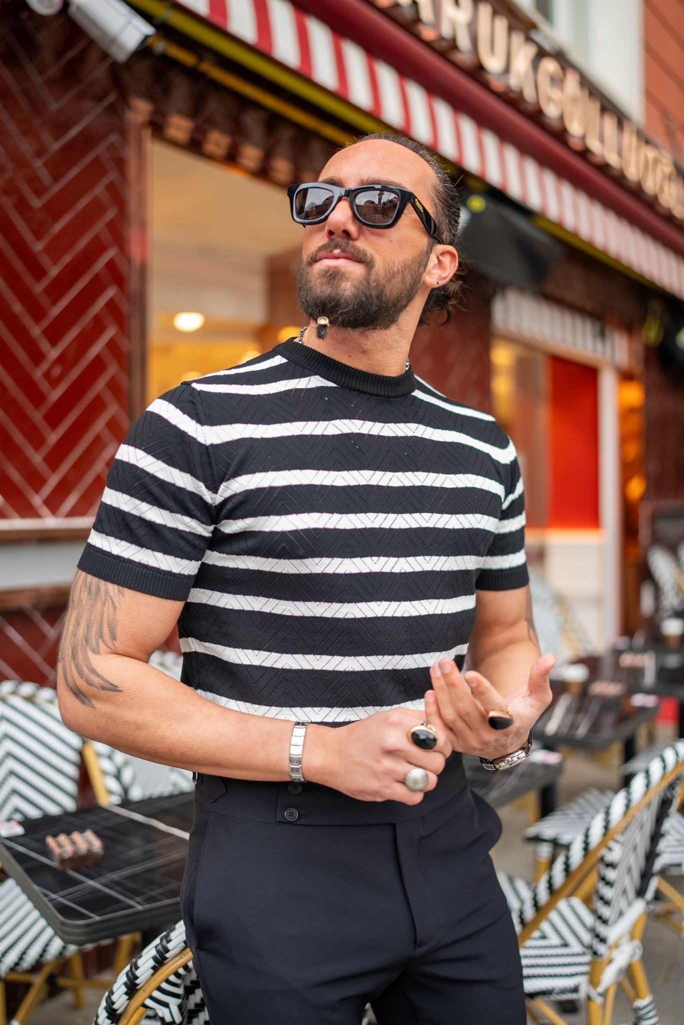 A Black Striped Havasu Patterned Crewneck on display 