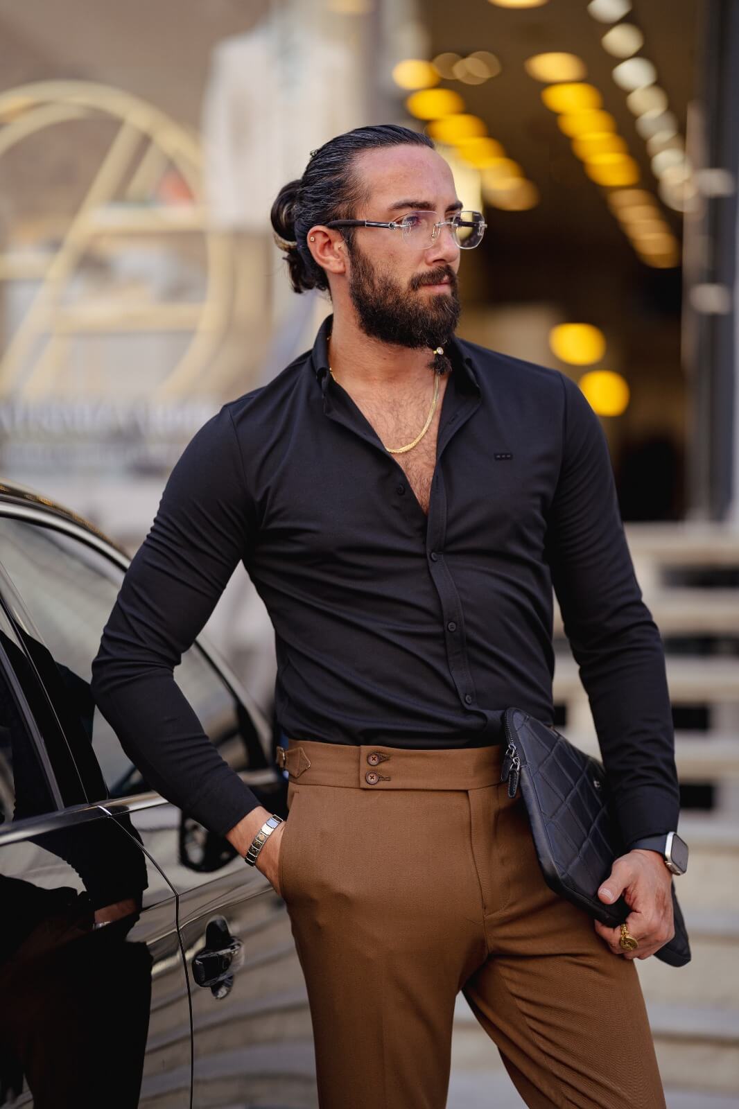 A Black Lycra Long Sleeve Shirt on display.