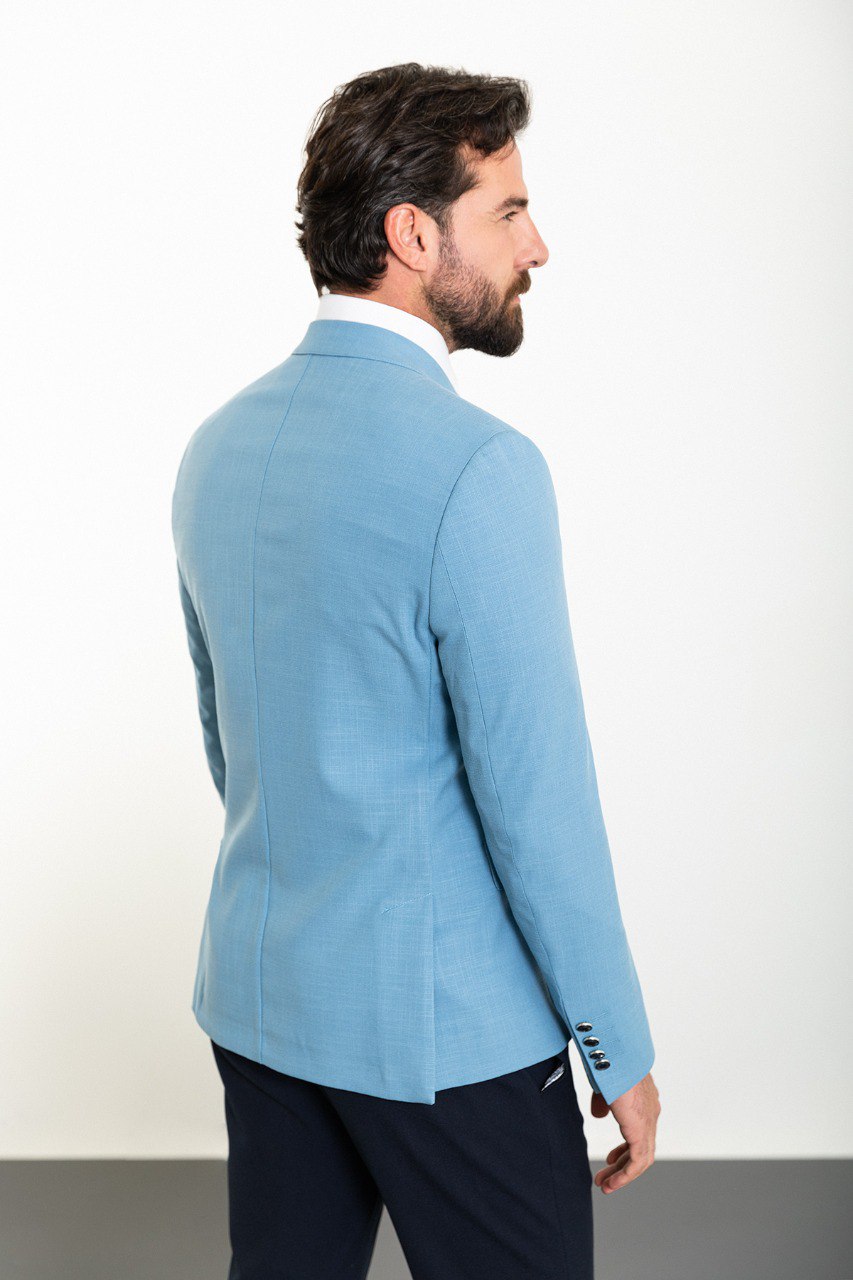 Double breasted light blue blazer from HolloMen, showcasing modern sophistication and refined tailoring.