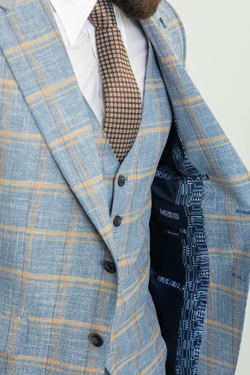 A Blue Checkered Suit on Display. 