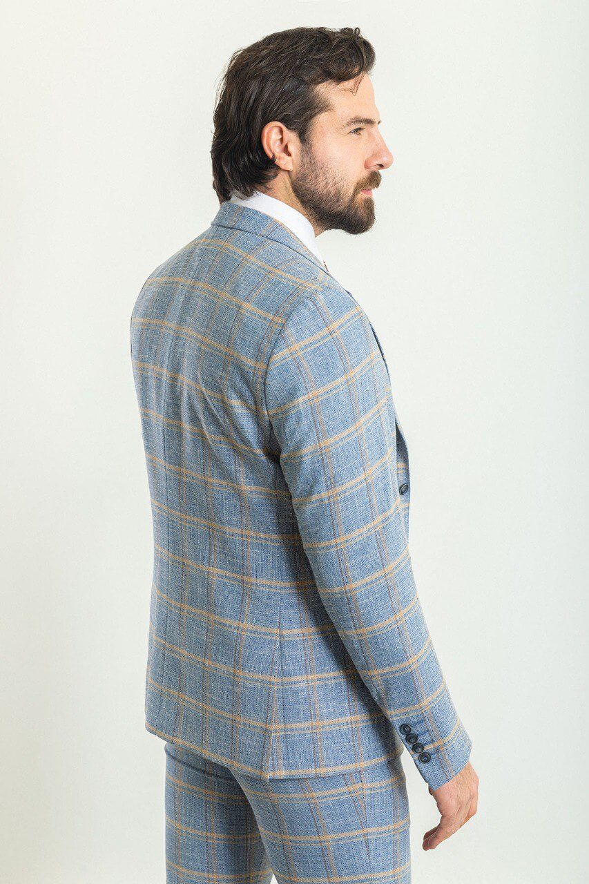 A Blue Checkered Suit on Display. 