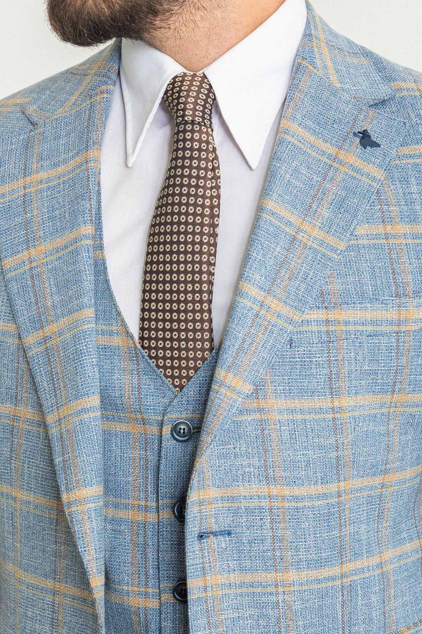 A Blue Checkered Suit on Display. 