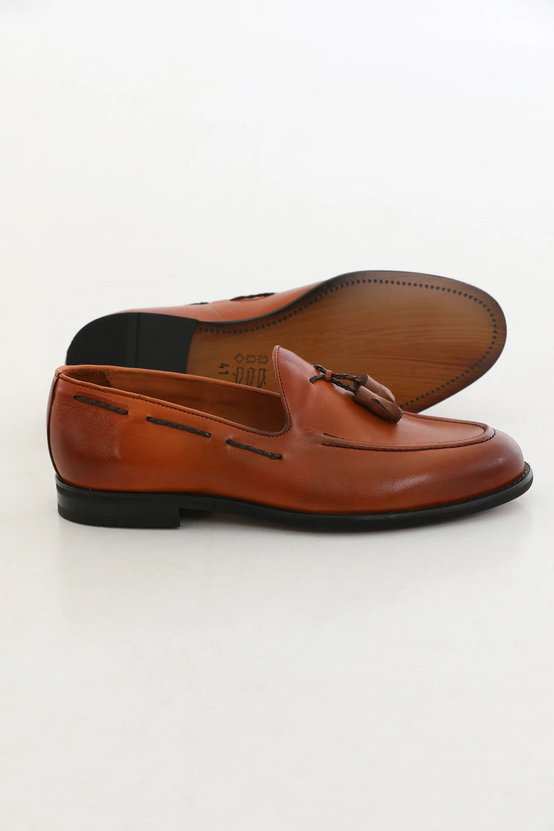 Handcrafted genuine Brown leather tassel loafers with calf leather lining and Neolithic sole.