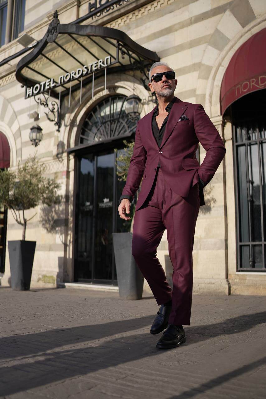 A Burgundy 2-Piece Suit on Display. 