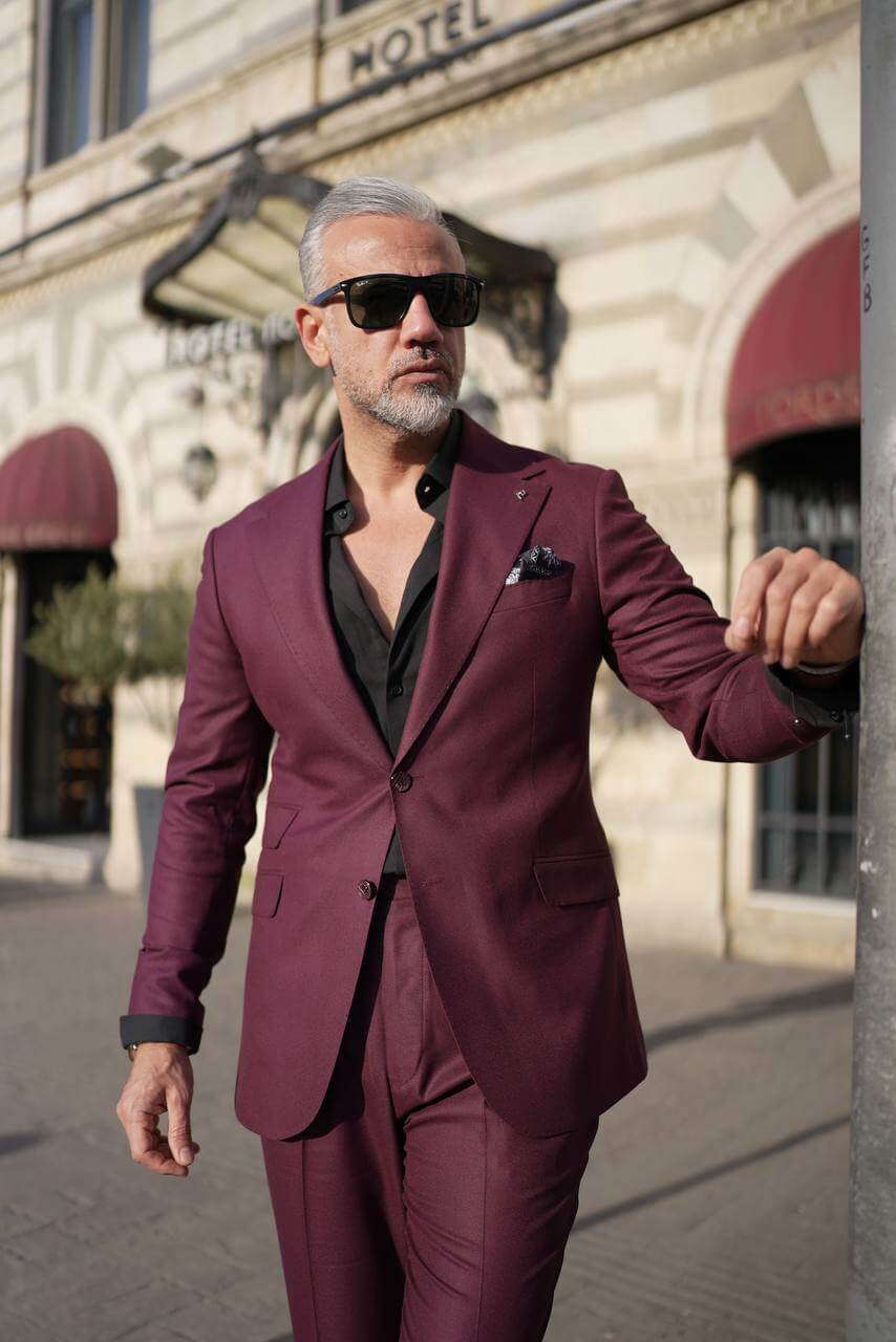 A Burgundy 2-Piece Suit on Display. 