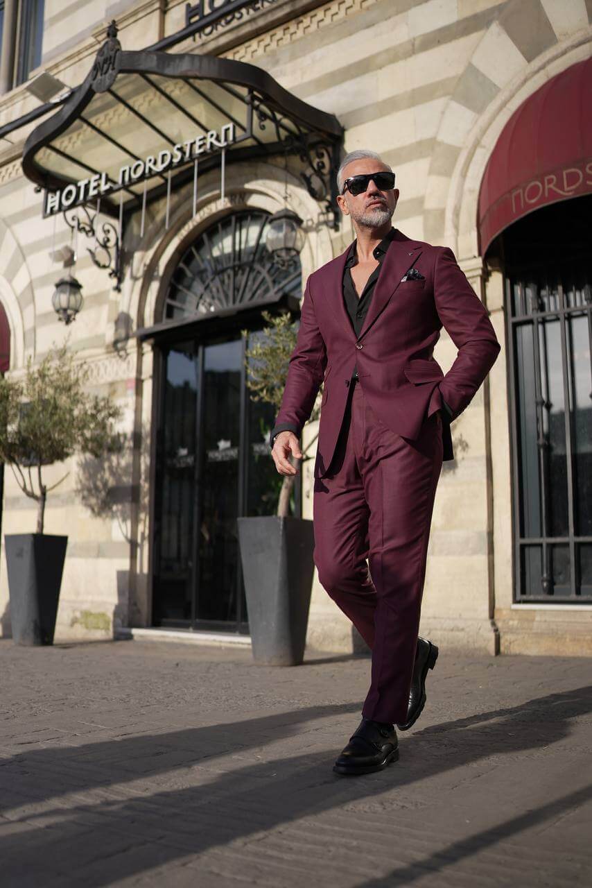 A Burgundy 2-Piece Suit on Display. 