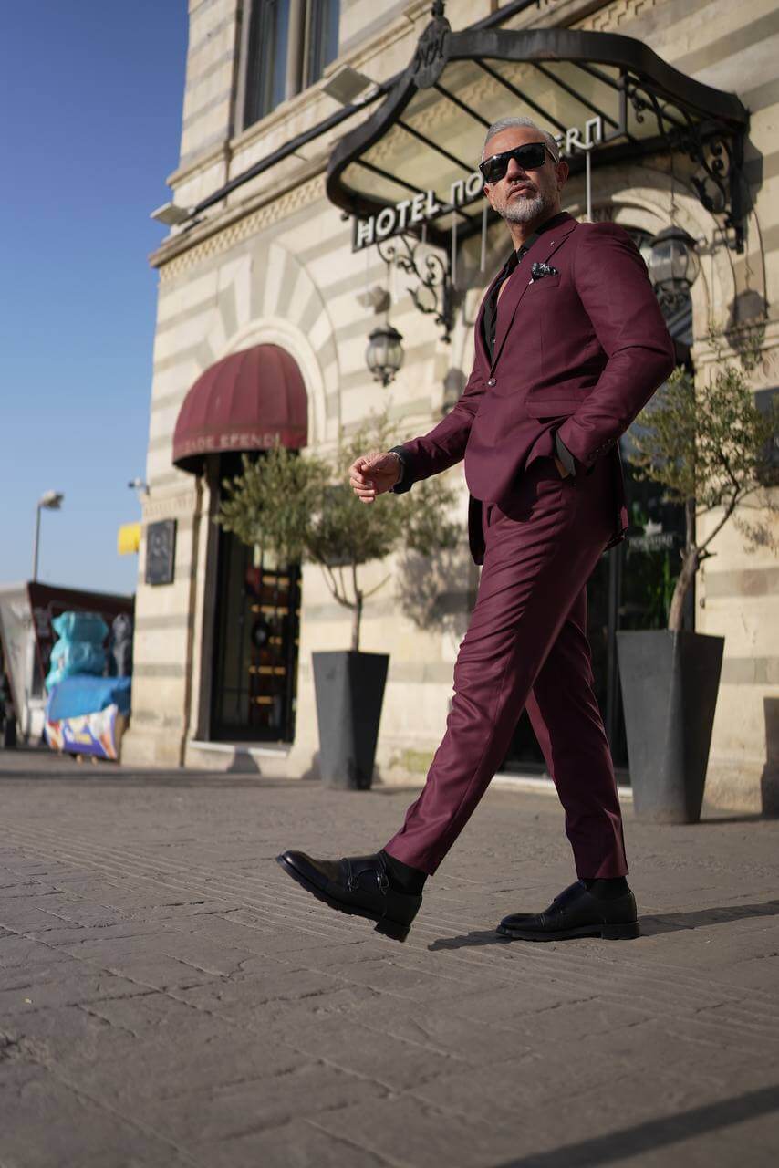 A Burgundy 2-Piece Suit on Display. 