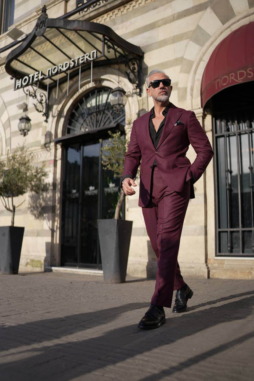 A Burgundy 2-Piece Suit on Display. 