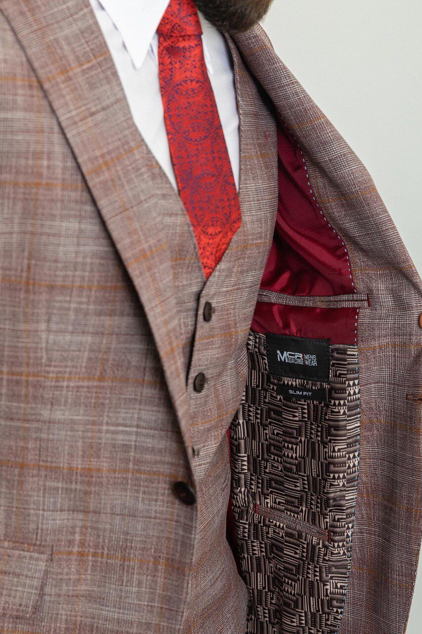 A Patterned Burgundy 3-Piece Suit on Display. 