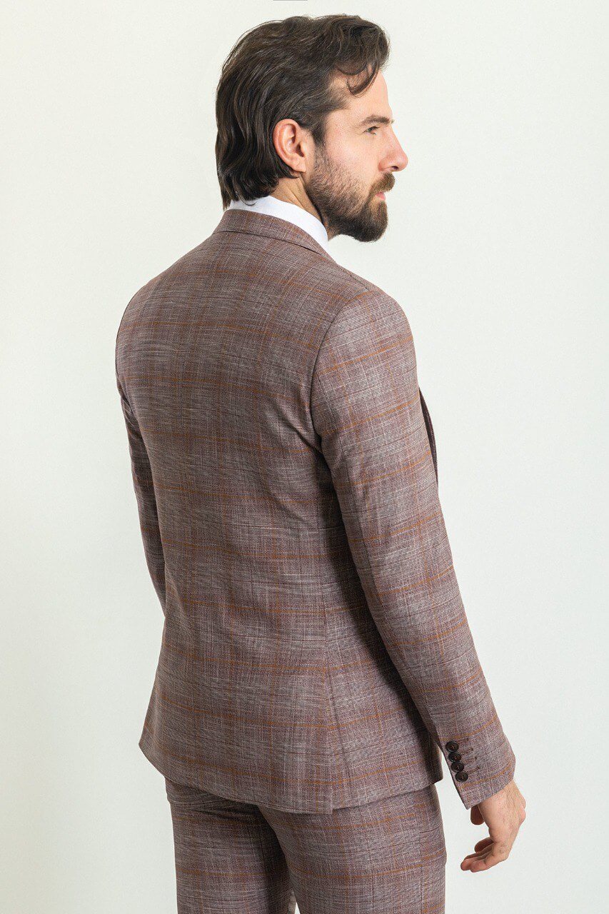 A Patterned Burgundy 3-Piece Suit on Display. 