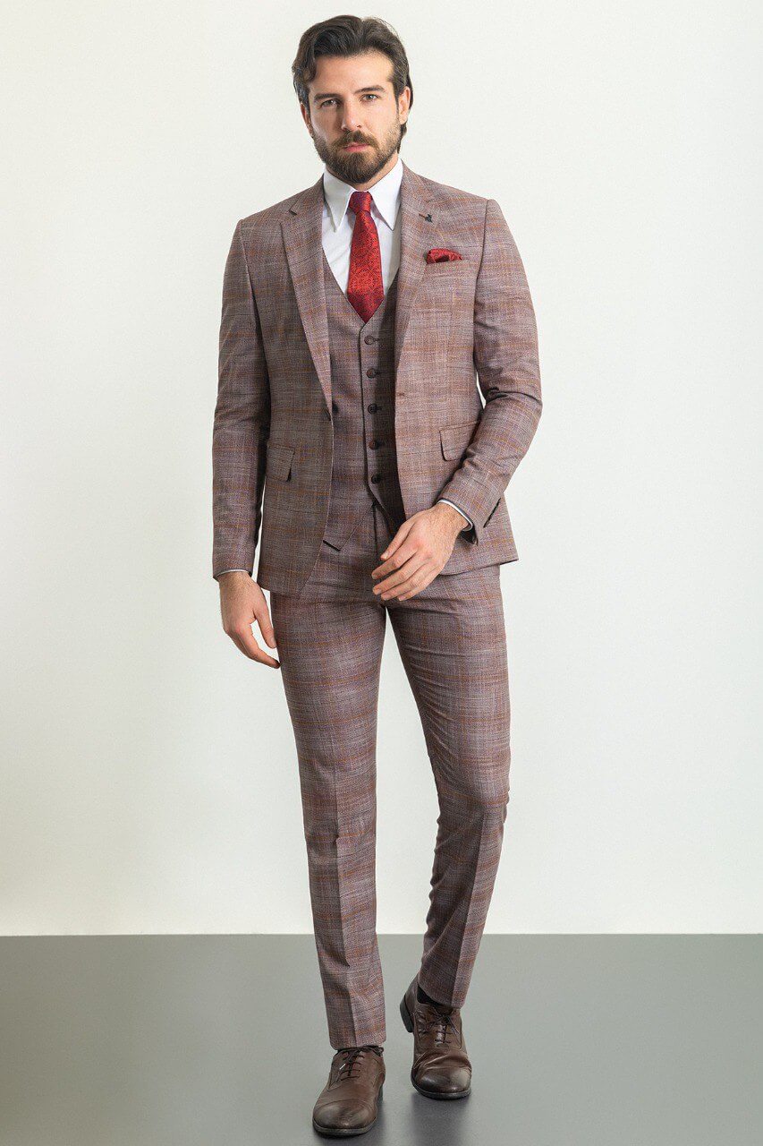 A Patterned Burgundy 3-Piece Suit on Display. 