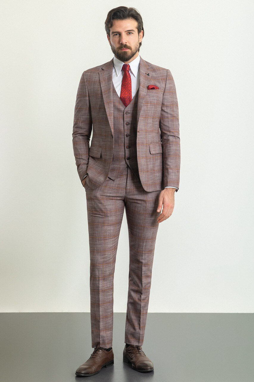 A Patterned Burgundy 3-Piece Suit on Display. 