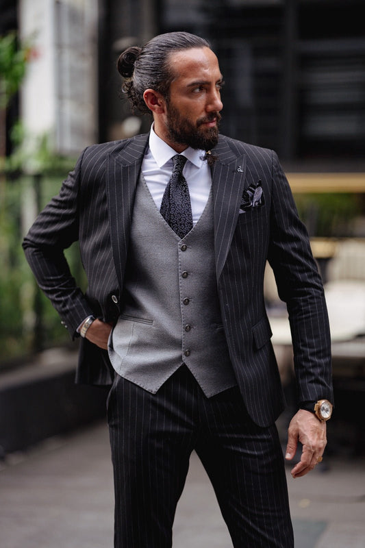 A Black Slim Fit Plaid Detailed Suit on display.