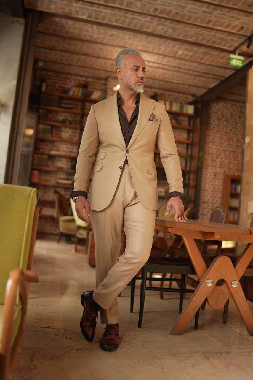 A Classic Beige 2-Piece Suit on Display. 