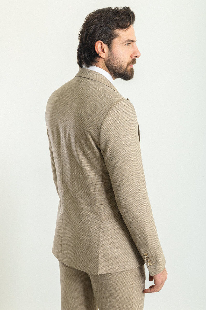 A Classic Beige 3-Piece Suit on Display. 