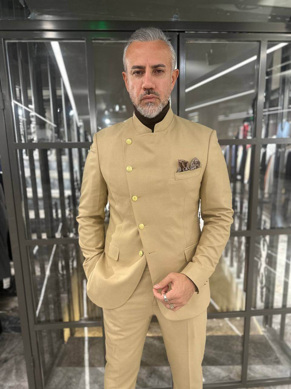 A Beige Suit on Display. 