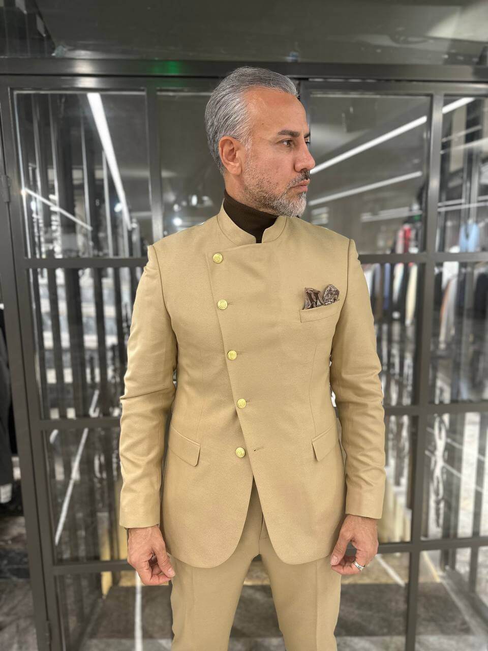 A Beige Suit on Display. 