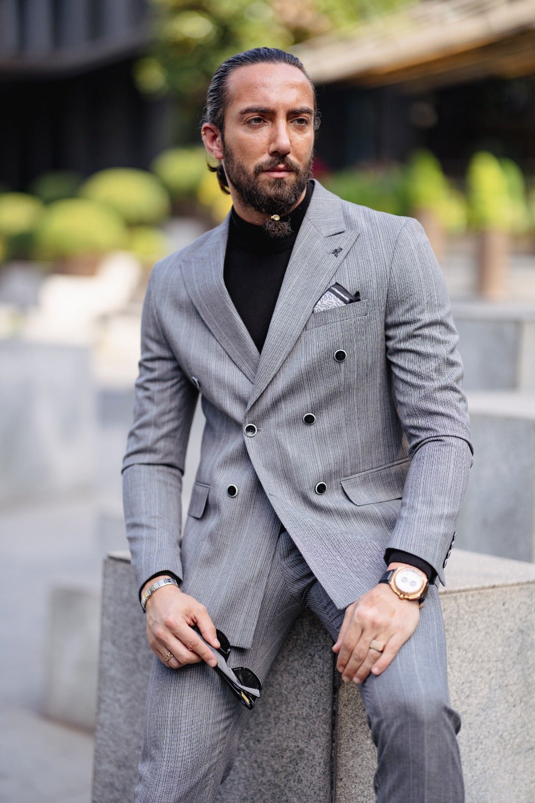 A Gray Slim Fit Double Breasted Suit on display.