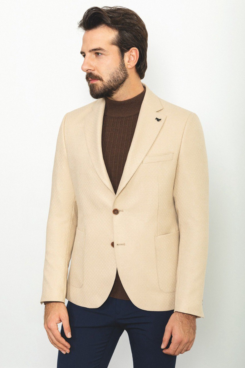 Side profile of the Eiffel Beige Jacket, highlighting the jacket's sleek design and premium fabric texture.