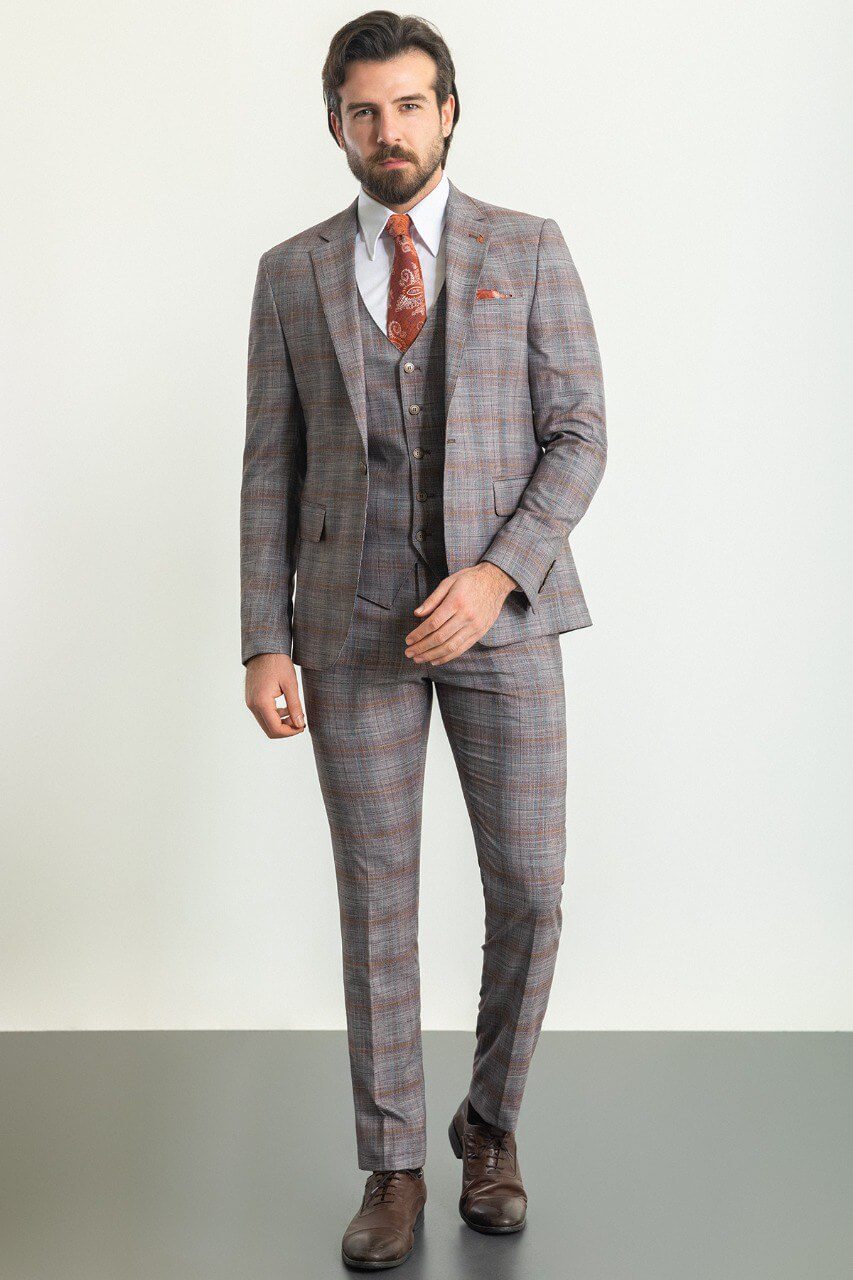 A Gray Orange Suit n Display. 