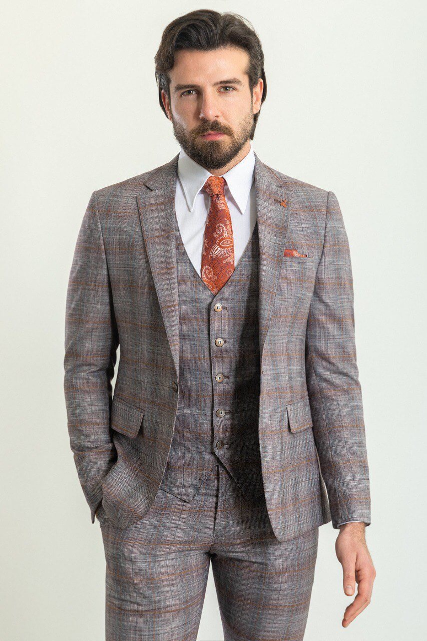 A Gray Orange Suit n Display. 