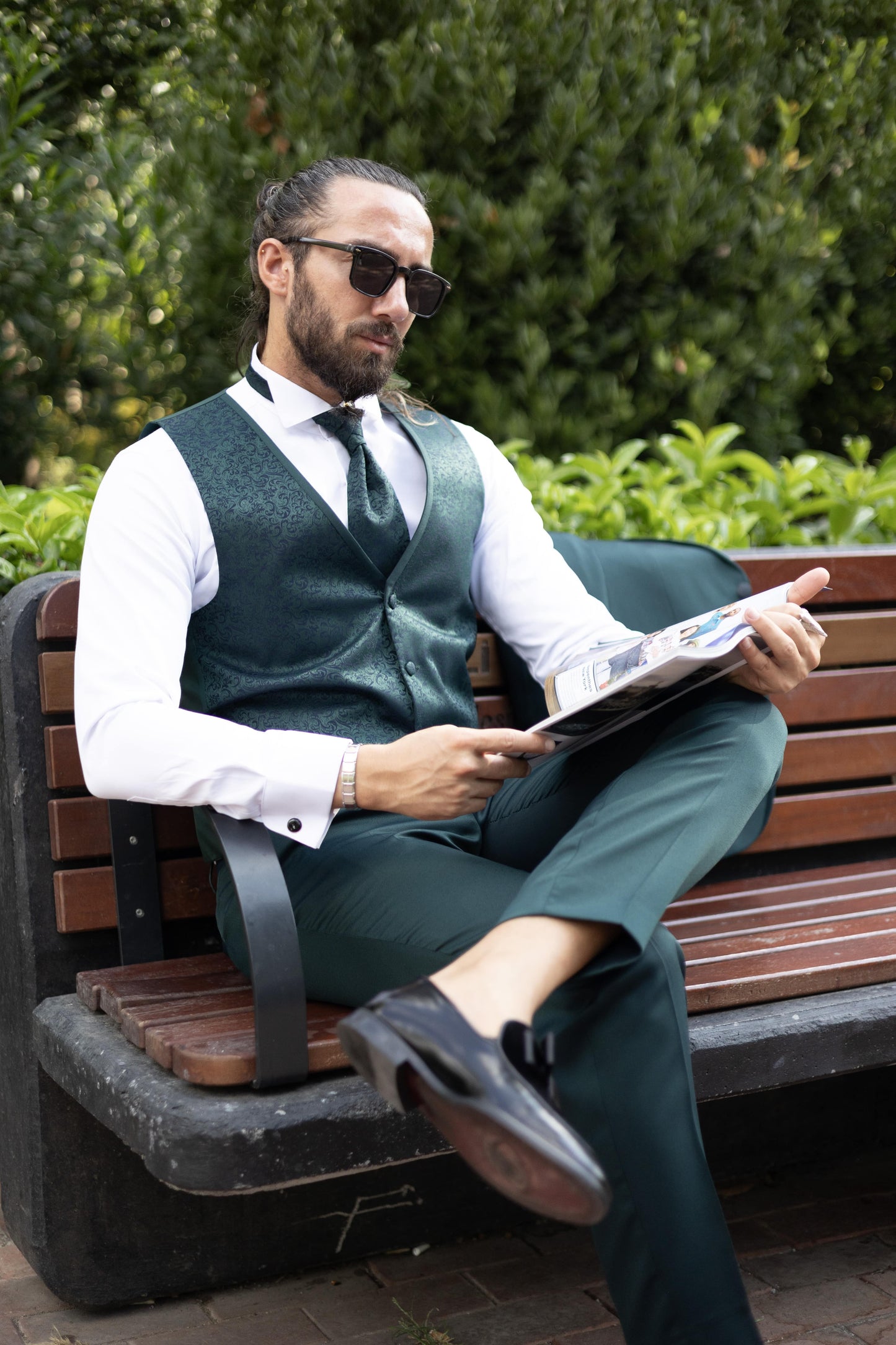 Emerald Elegance Three-Piece Suit for men in deep emerald green, perfect for weddings and formal events.