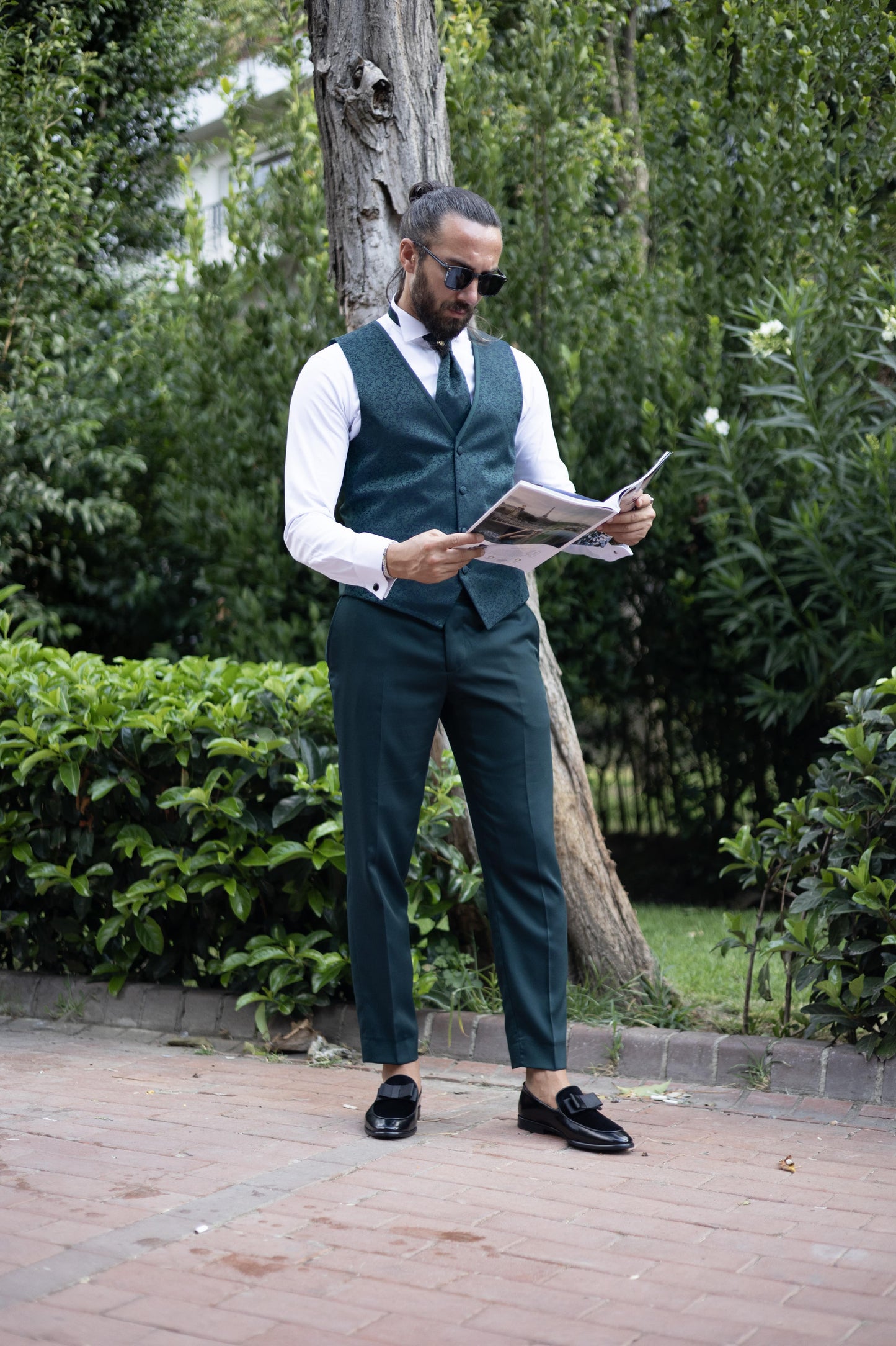 Emerald Elegance Three-Piece Suit for men in deep emerald green, perfect for weddings and formal events.