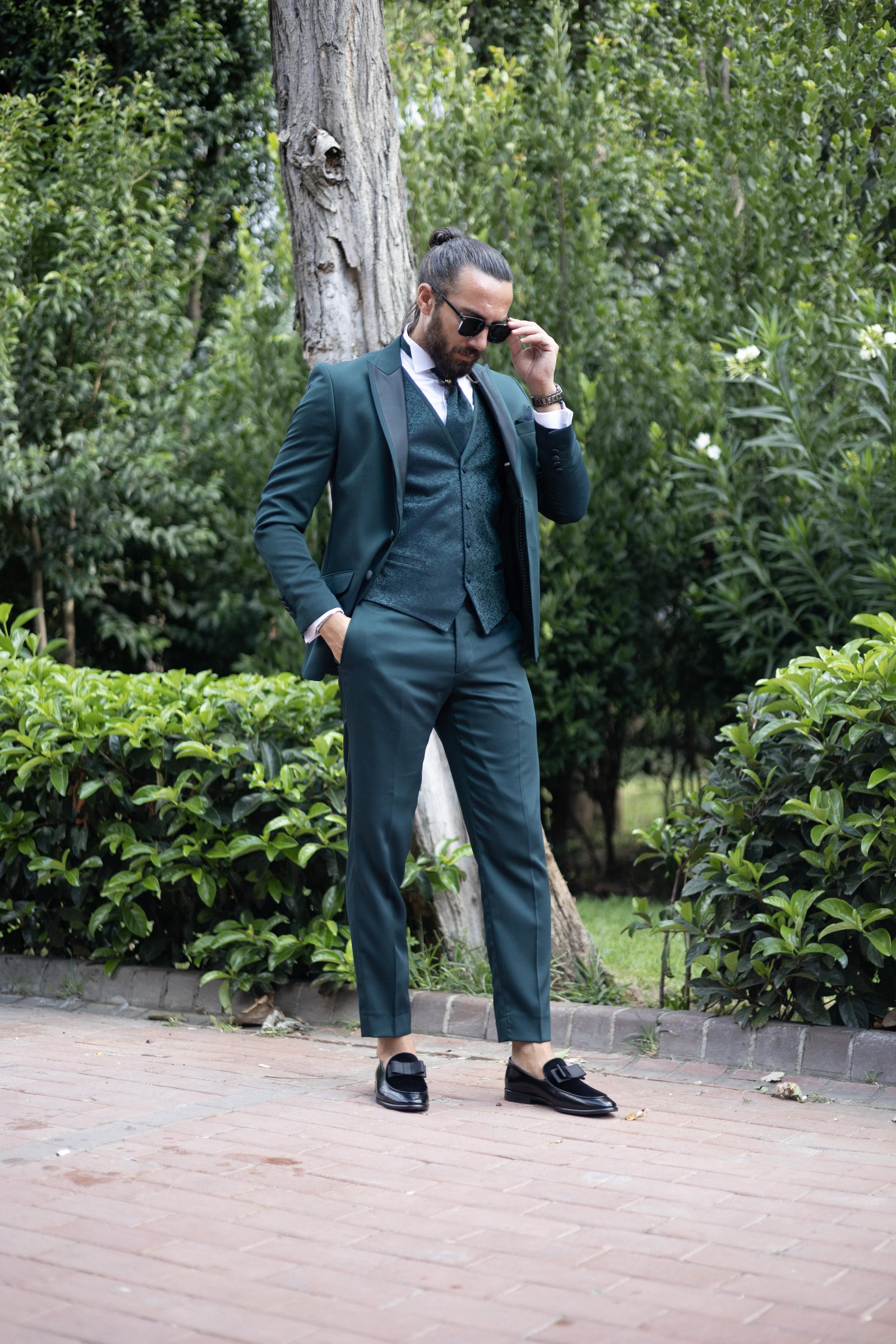 Emerald Elegance Three-Piece Suit for men in deep emerald green, perfect for weddings and formal events.