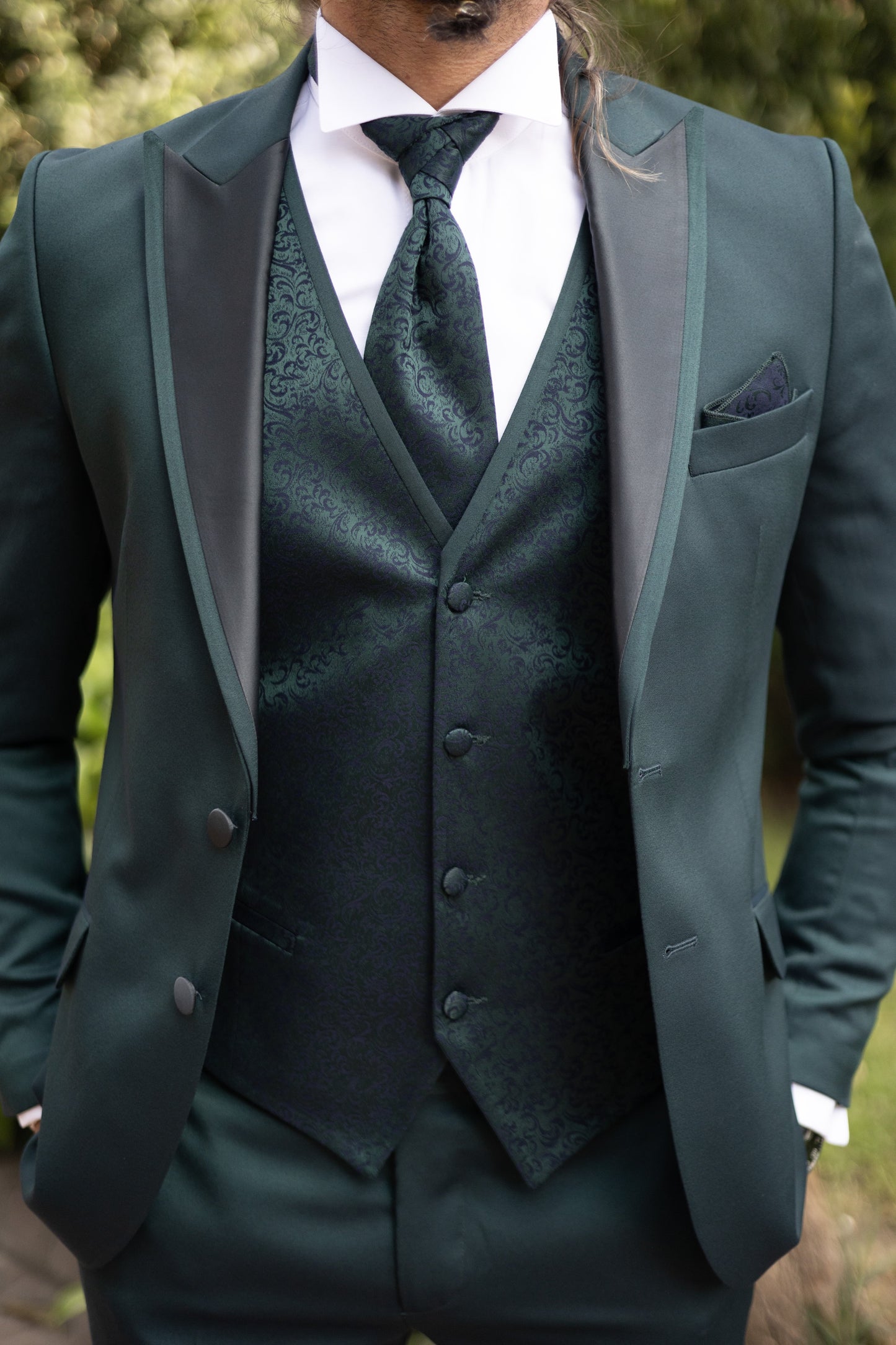 Emerald Elegance Three-Piece Suit for men in deep emerald green, perfect for weddings and formal events.