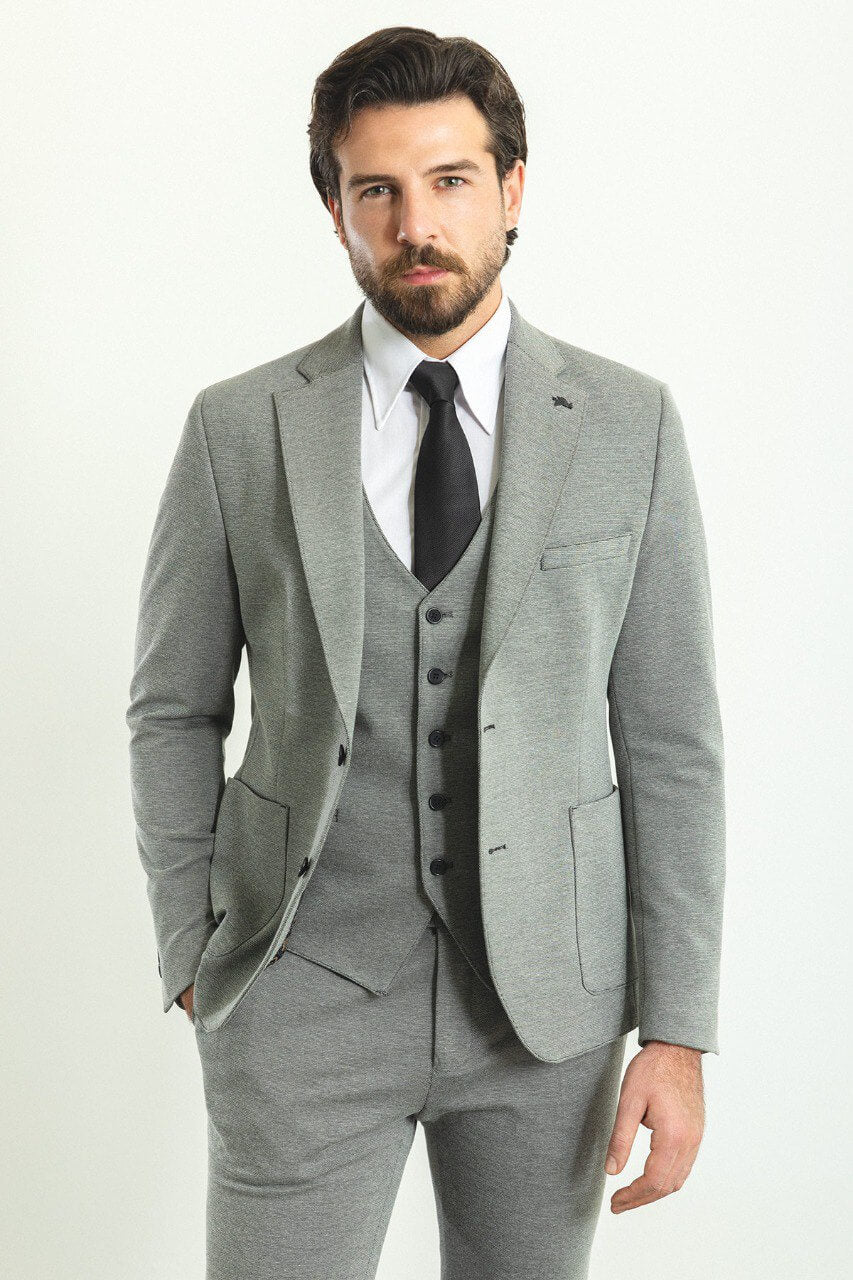 A  Gray 3-Piece Suit on Display. 