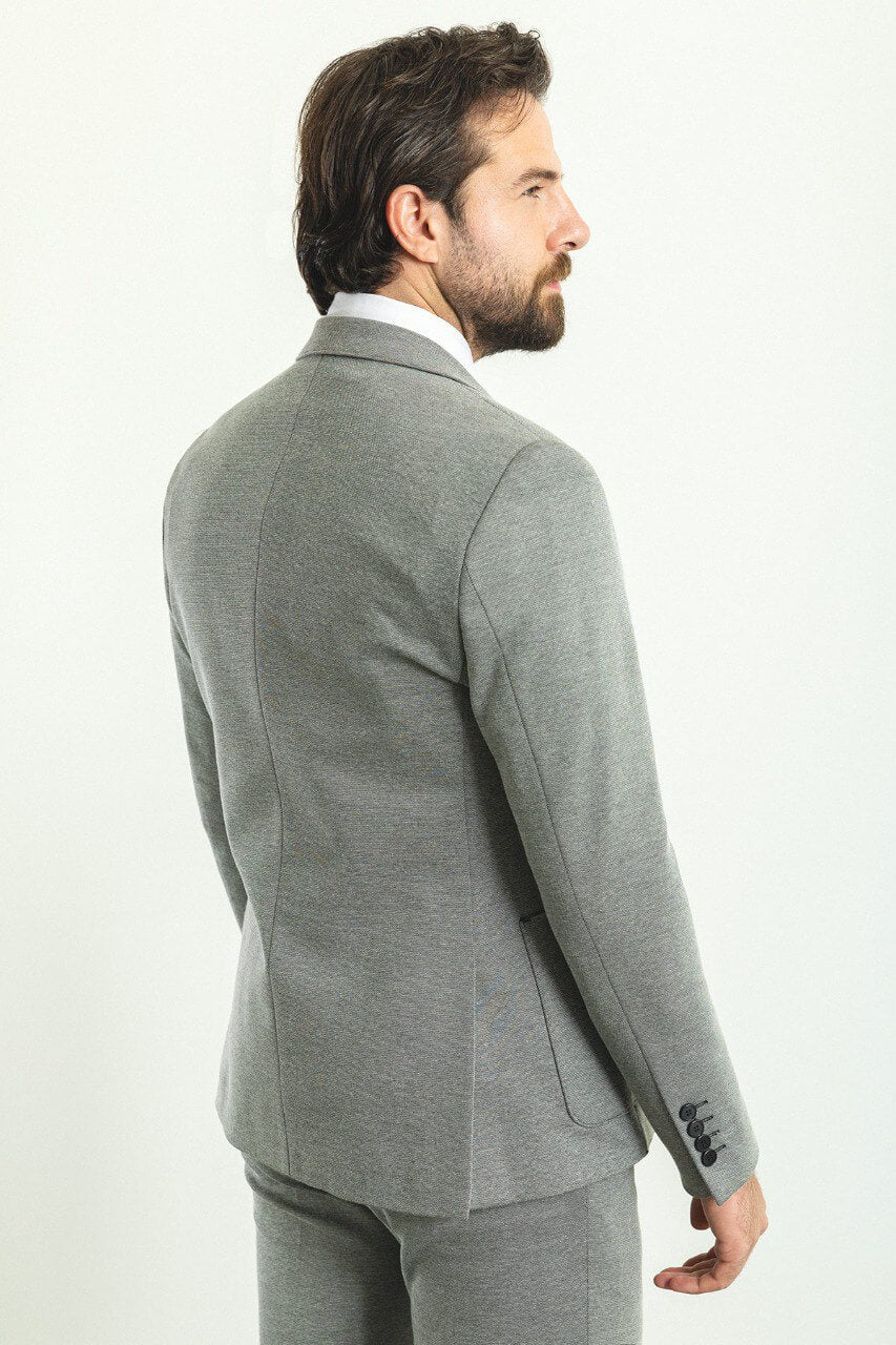 A  Gray 3-Piece Suit on Display. 