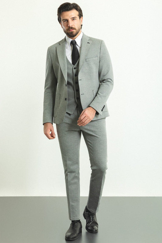 A  Gray 3-Piece Suit on Display. 