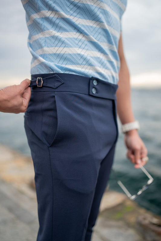 A Mara Navy Blue Trousers on display